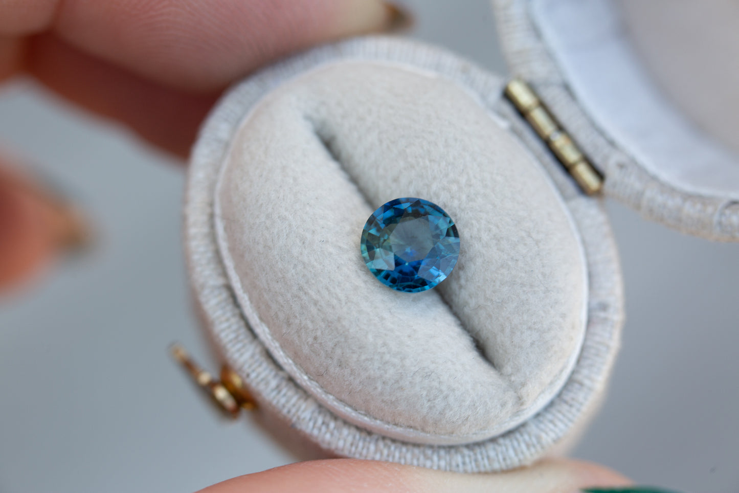 1.23ct round blue green sapphire
