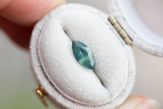 Load image into Gallery viewer, 1.15ct marquise opalescent teal sapphire
