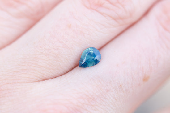 Load image into Gallery viewer, .76ct pear opalescent blue teal sapphire
