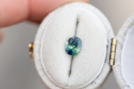 .93ct oval opalescent blue green bi color sapphire