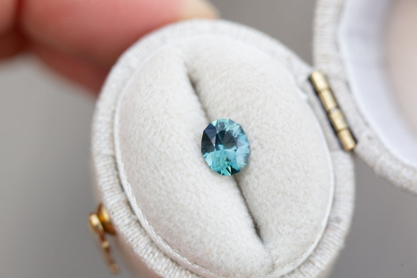 .83ct oval opalescent teal blue sapphire