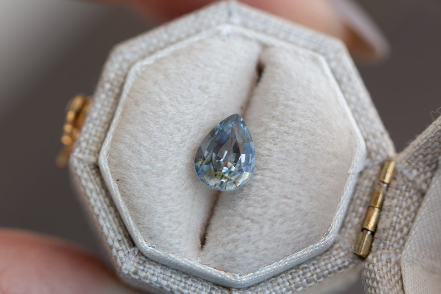 Load image into Gallery viewer, 1.48ct pear blue sapphire with yellow zoning
