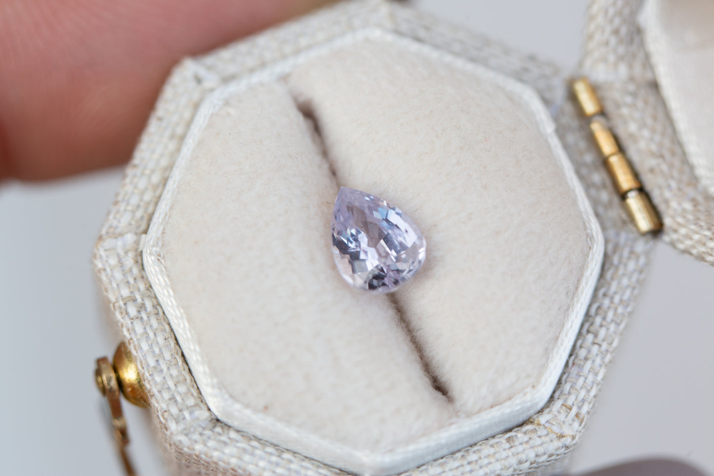 .96ct, 7x5mm pear light lavender sapphire