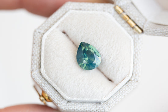 1.52ct opalescent teal pear sapphire