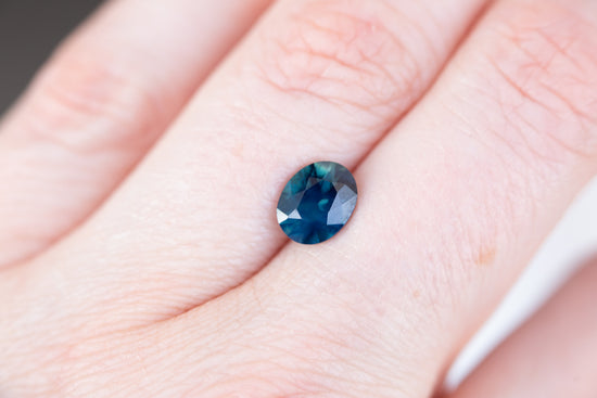 1.89ct dark opalescent blue green sapphire