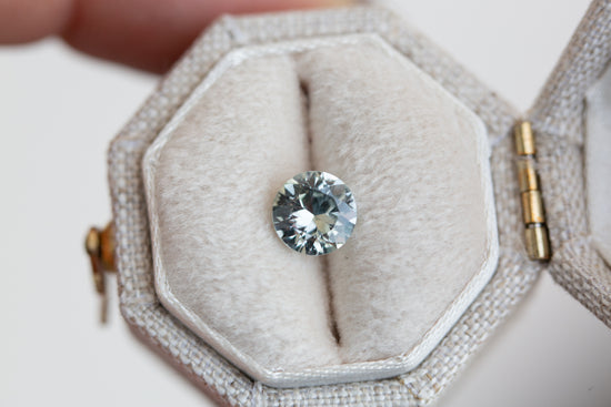 ON HOLD .88ct light pale green round sapphire