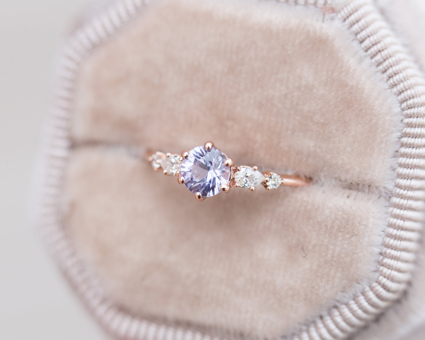 Round lavender and diamond five stone ring