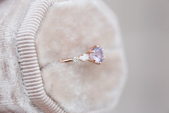 Round lavender and diamond five stone ring