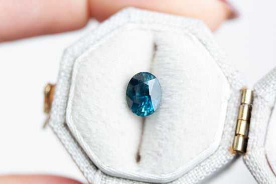 Load image into Gallery viewer, 1.52ct oval deep teal blue sapphire
