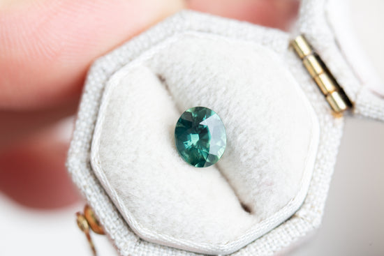 Load image into Gallery viewer, 1.24ct oval deep teal green sapphire
