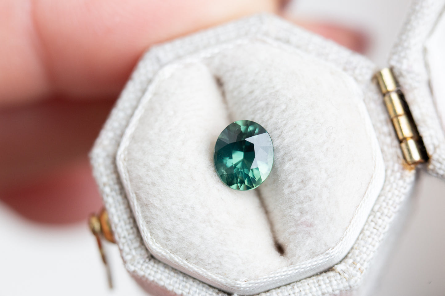 Load image into Gallery viewer, 1.24ct oval deep teal green sapphire
