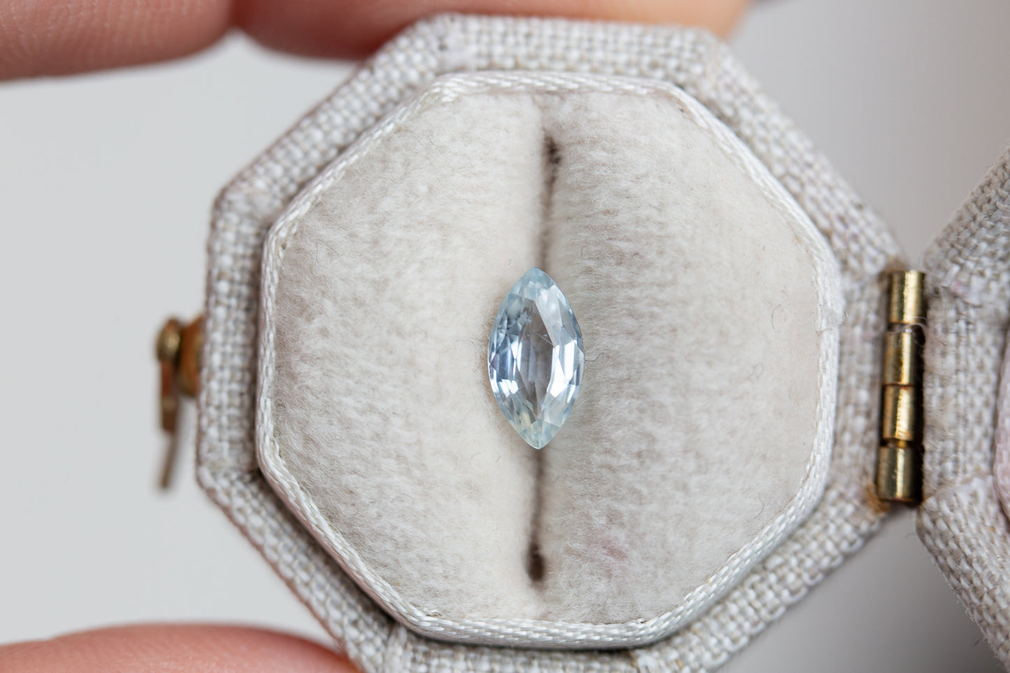 Load image into Gallery viewer, .72ct marquise pale blue sapphire
