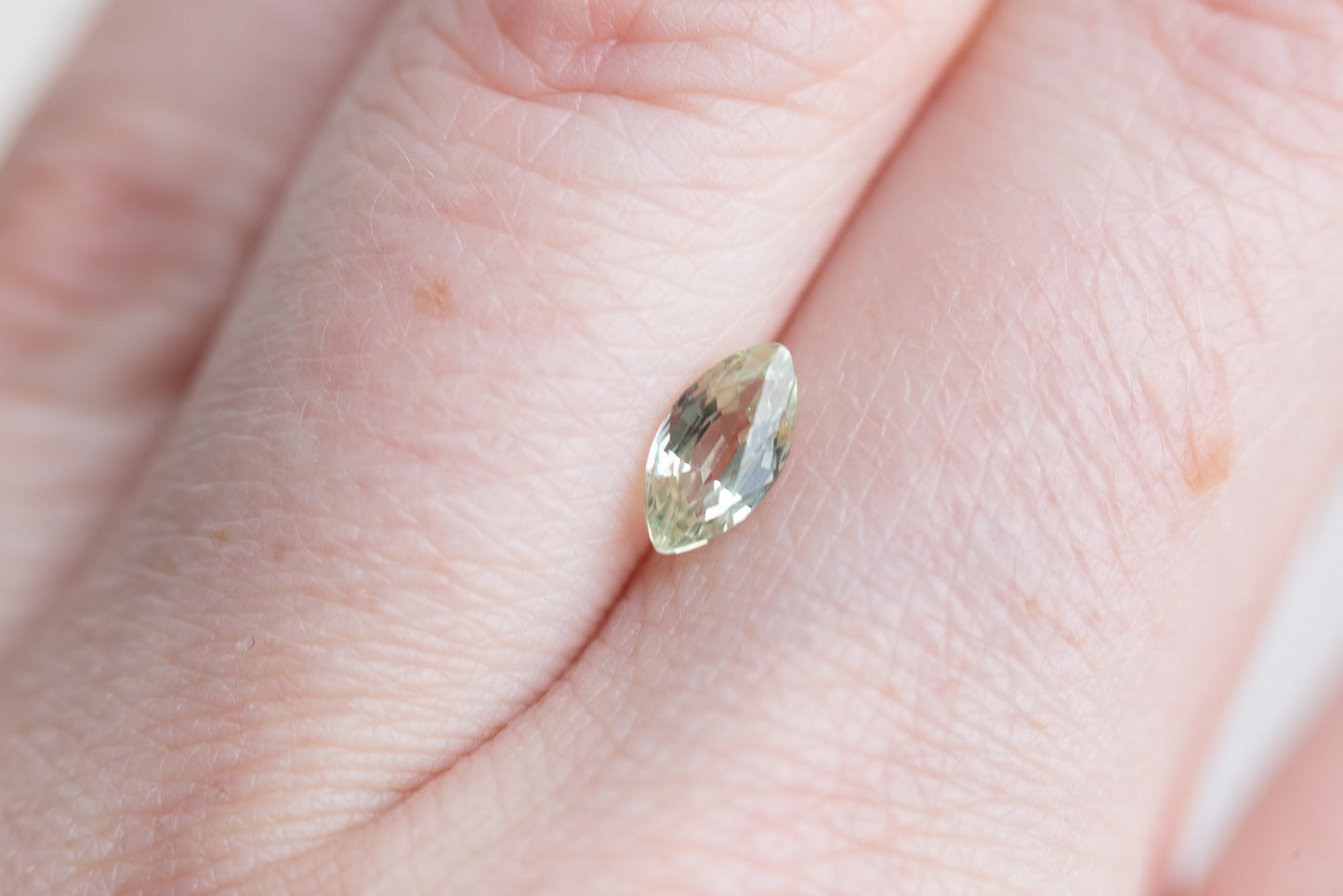 ON HOLD .76ct marquise light green/yellow sapphire