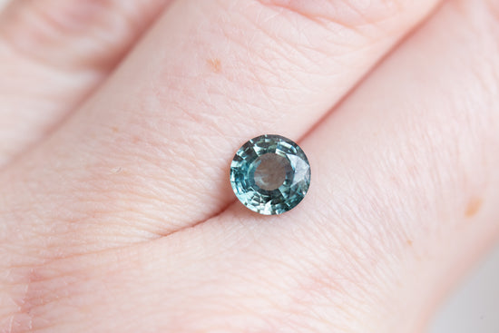 Load image into Gallery viewer, 1.56ct round teal green sapphire
