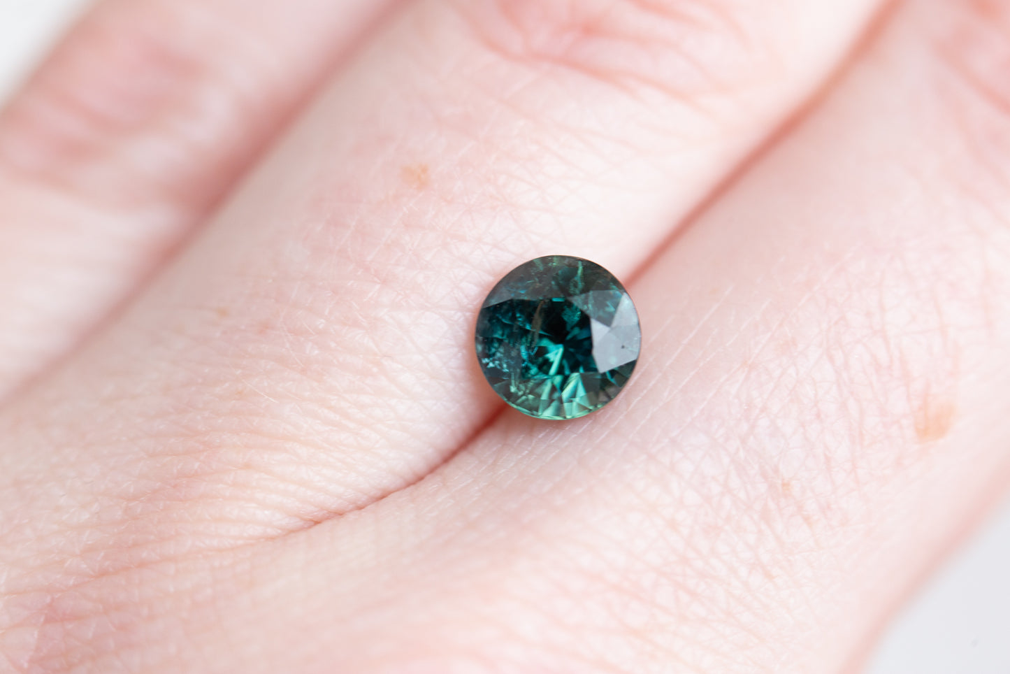 2.07ct round teal blue sapphire