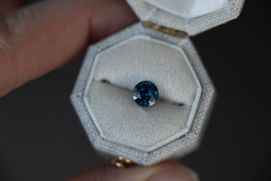 ON HOLD 1.24ct round blue green sapphire