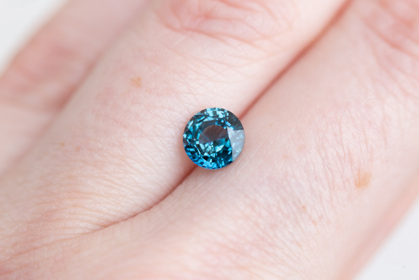 1.53ct round teal blue sapphire