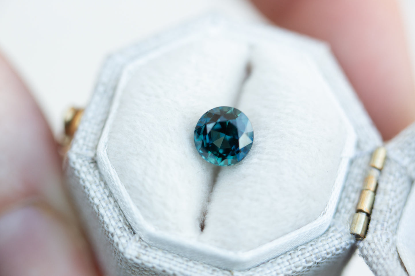 1.37ct round blue green sapphire