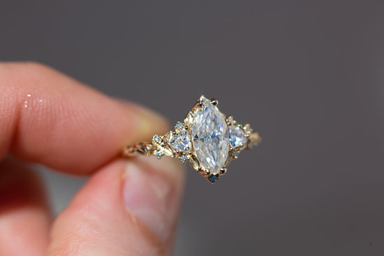 Briar rose three stone with 10x5mm marquise moissanite
