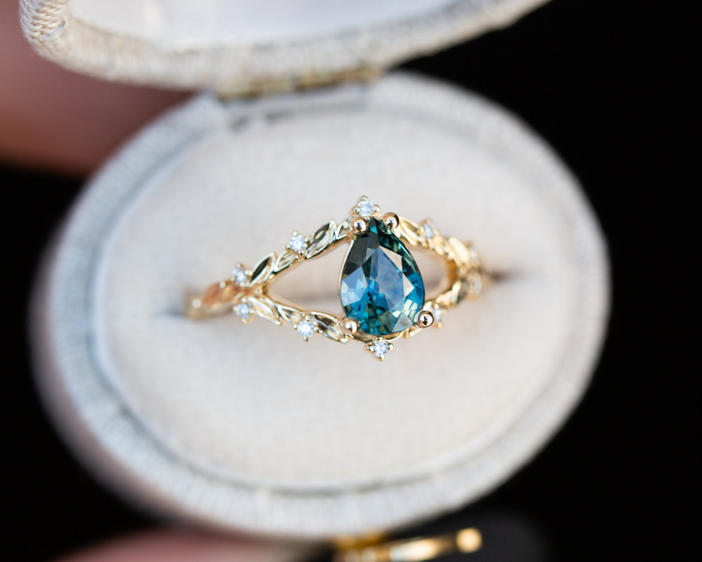 Briar rose with teal Montana sapphire