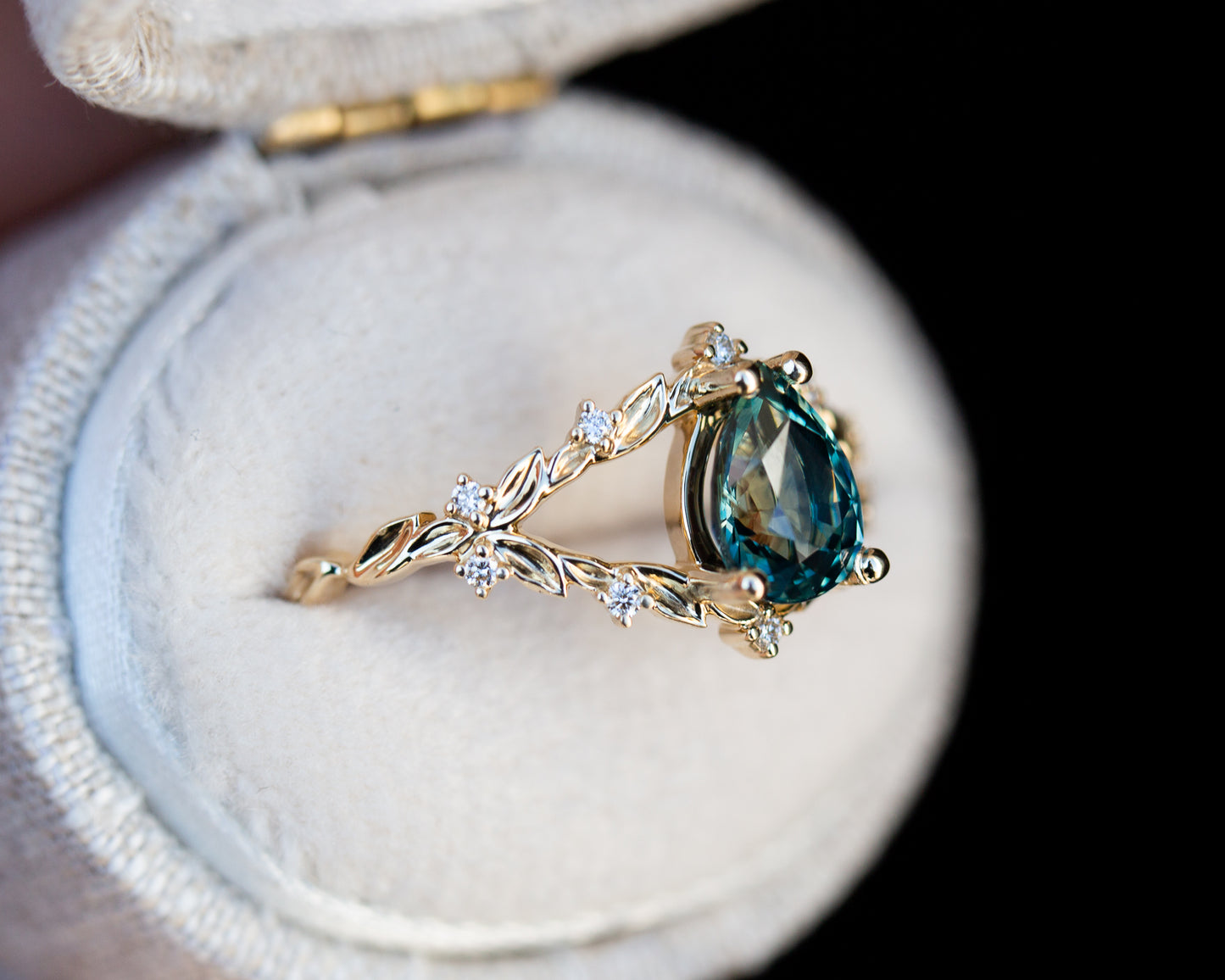 Briar rose with teal Montana sapphire