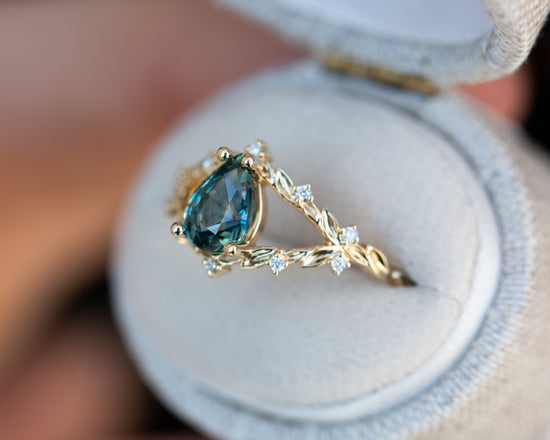 Briar rose with teal Montana sapphire