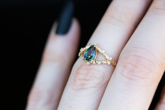 Briar rose with teal Montana sapphire