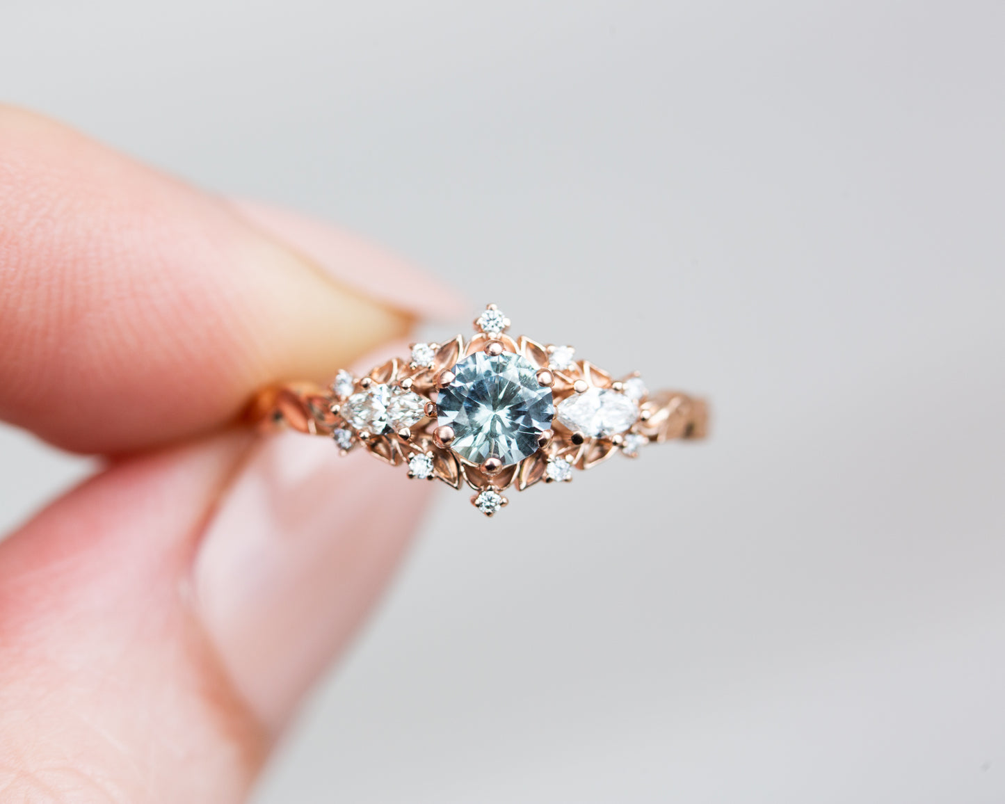 Briar rose three stone with round Montana sapphire