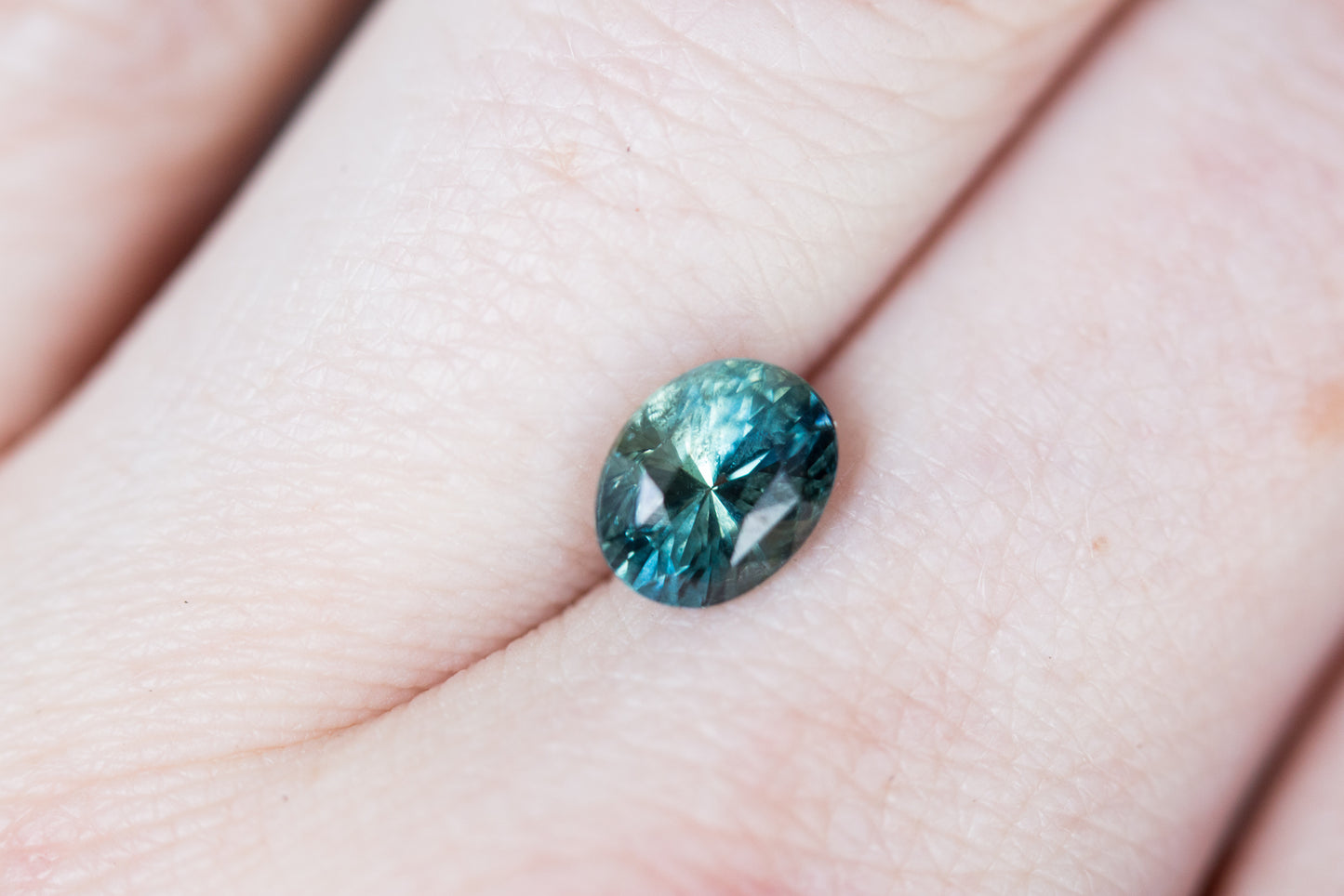 Load image into Gallery viewer, 2.1ct oval blue/teal sapphire
