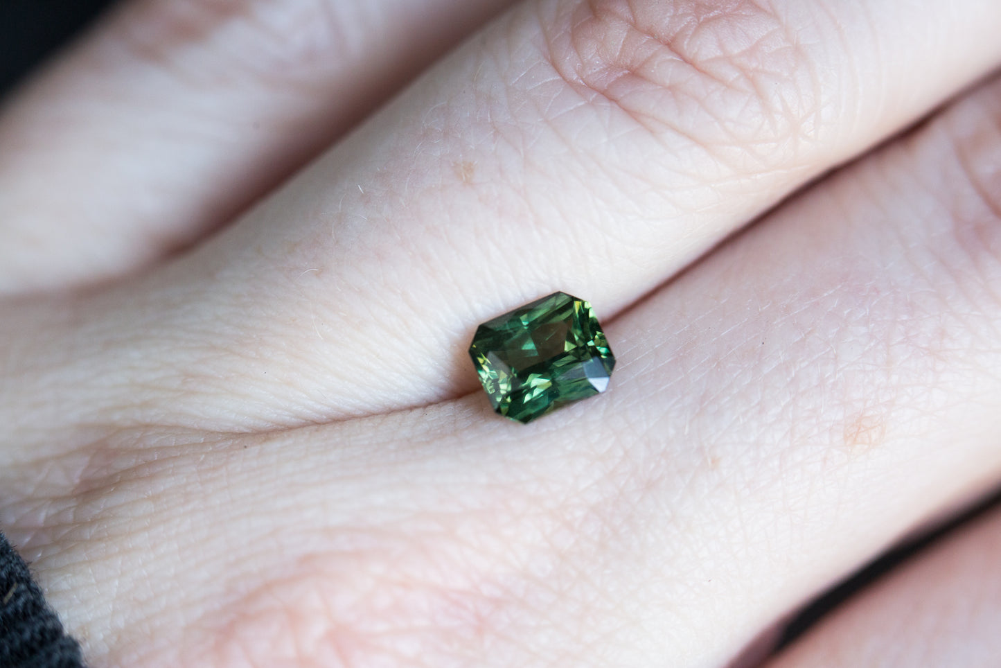 Load image into Gallery viewer, 1.55ct Green emerald cut sapphire
