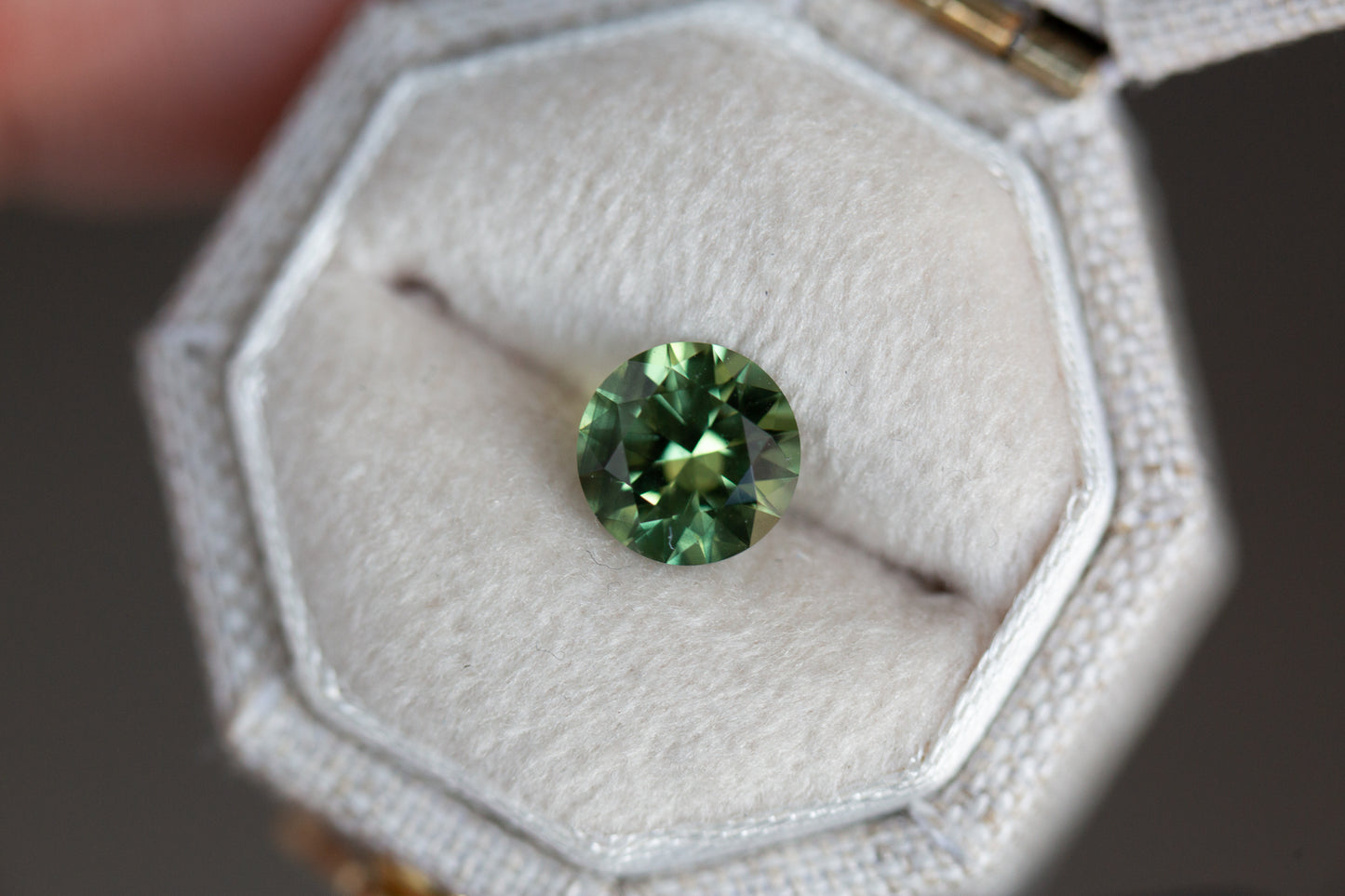 1.34ct round green Australian sapphire