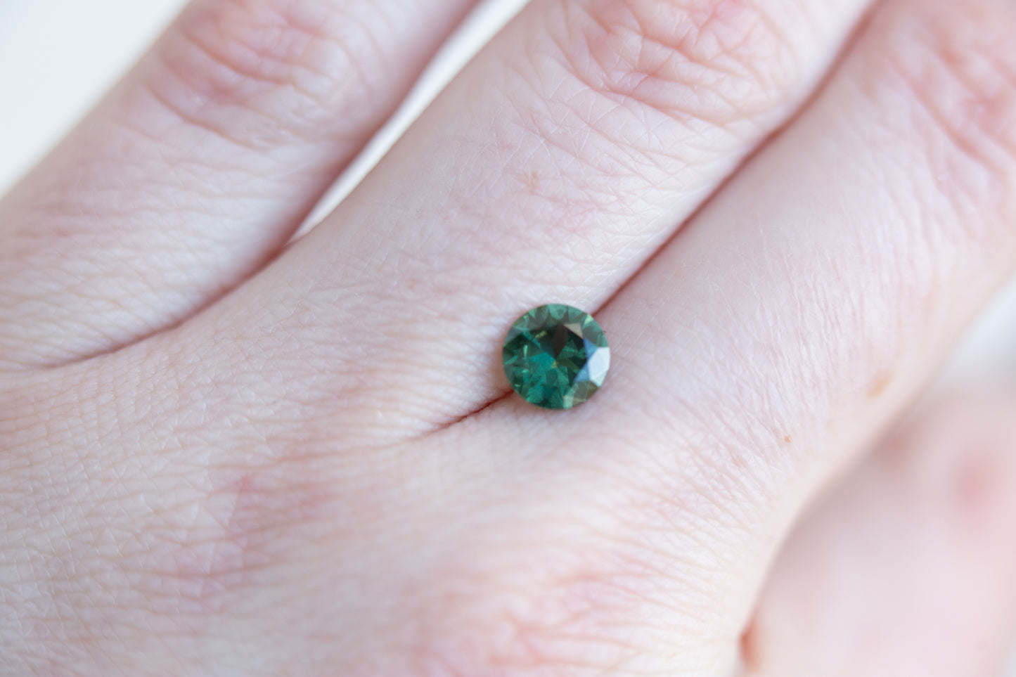 1.12ct round green Australian sapphire