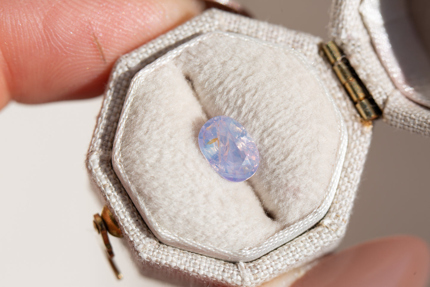 Load image into Gallery viewer, 1.18ct oval lavender grey opalescent sapphire
