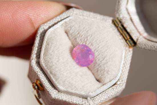 1.41ct oval opalescent pink orange sapphire