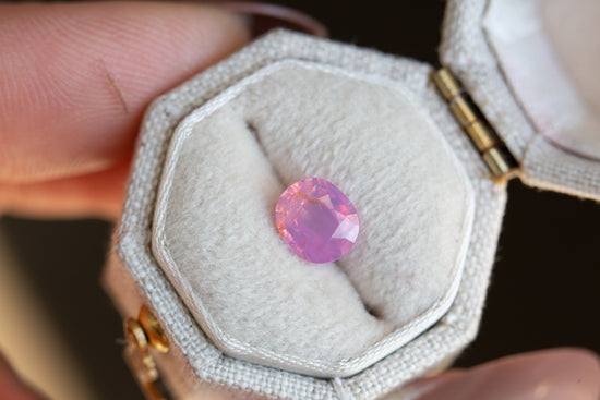 1.41ct oval opalescent pink orange sapphire