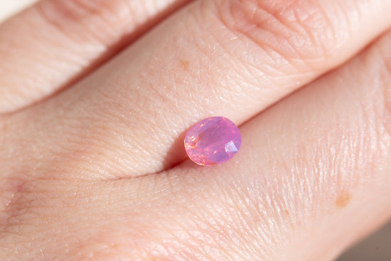 1.41ct oval opalescent pink orange sapphire