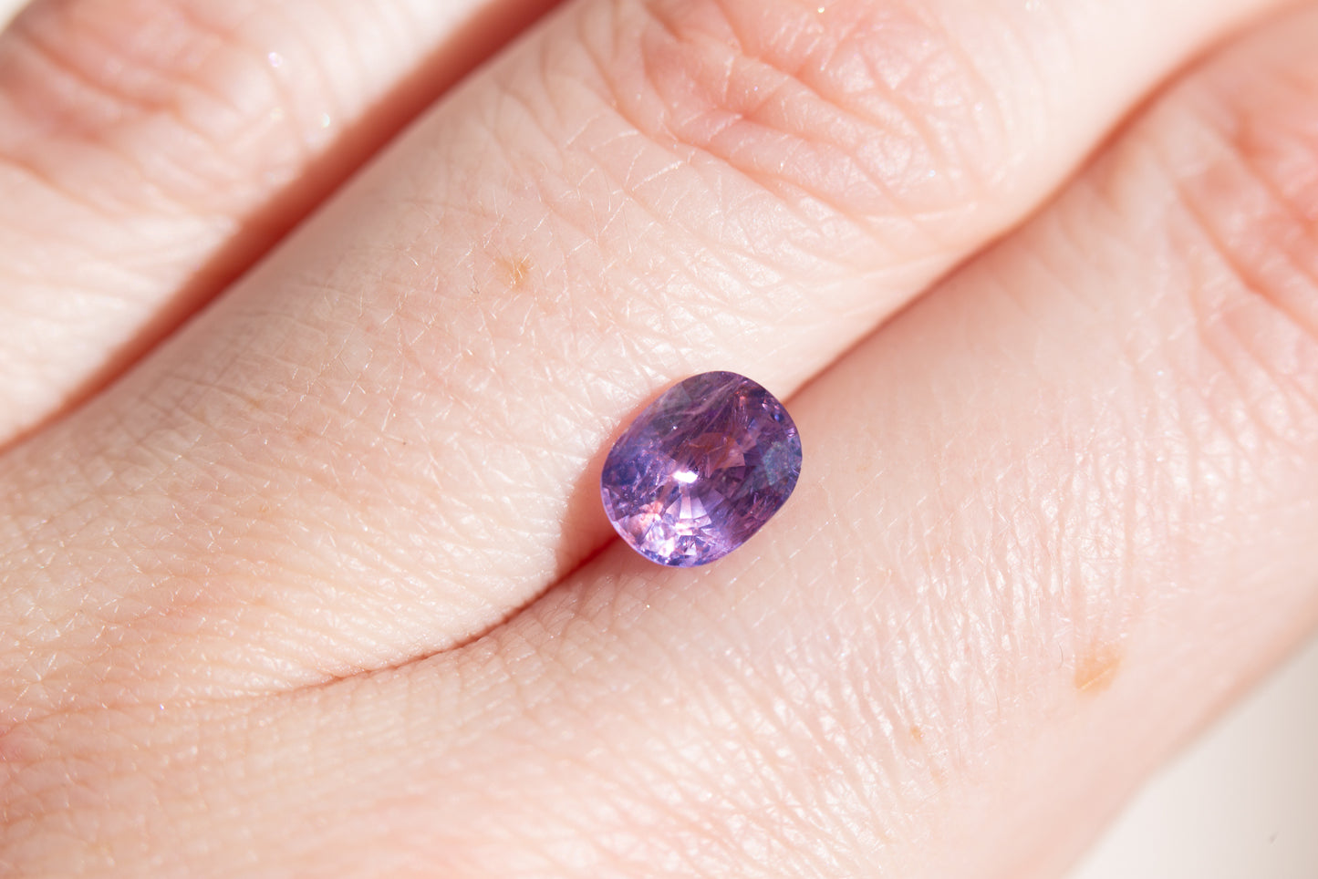 1.56ct oval purple opalescent sapphire