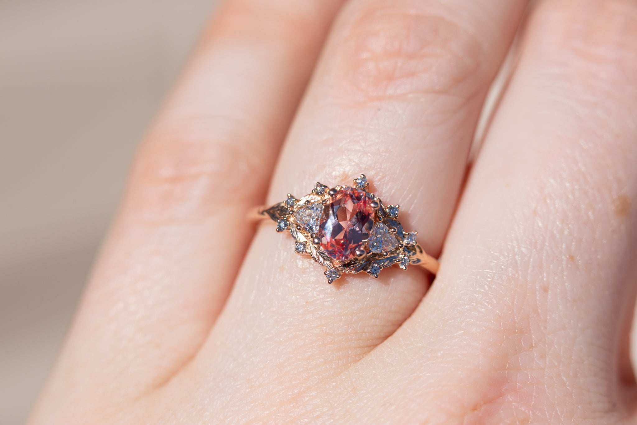 Woodland three stone setting with oval peach sapphire – Oore Jewelry