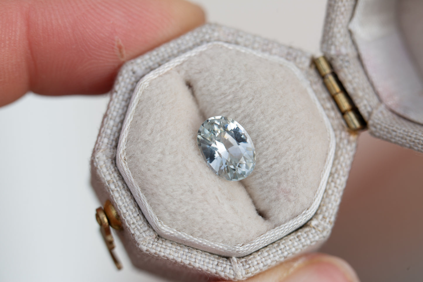 1.75ct oval white/silver sapphire