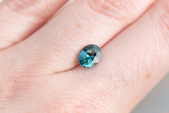 Load image into Gallery viewer, 1.66ct oval teal sapphire

