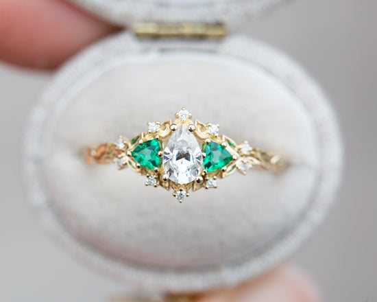 Briar rose three stone with pear moissanite and lab emerald (fairy queen ring)