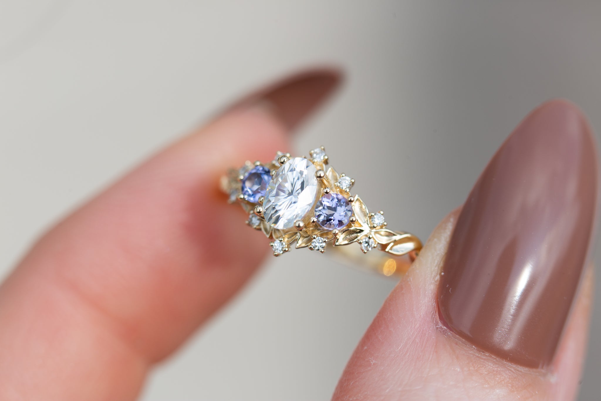 Briar rose three stone with oval moissanite and round
