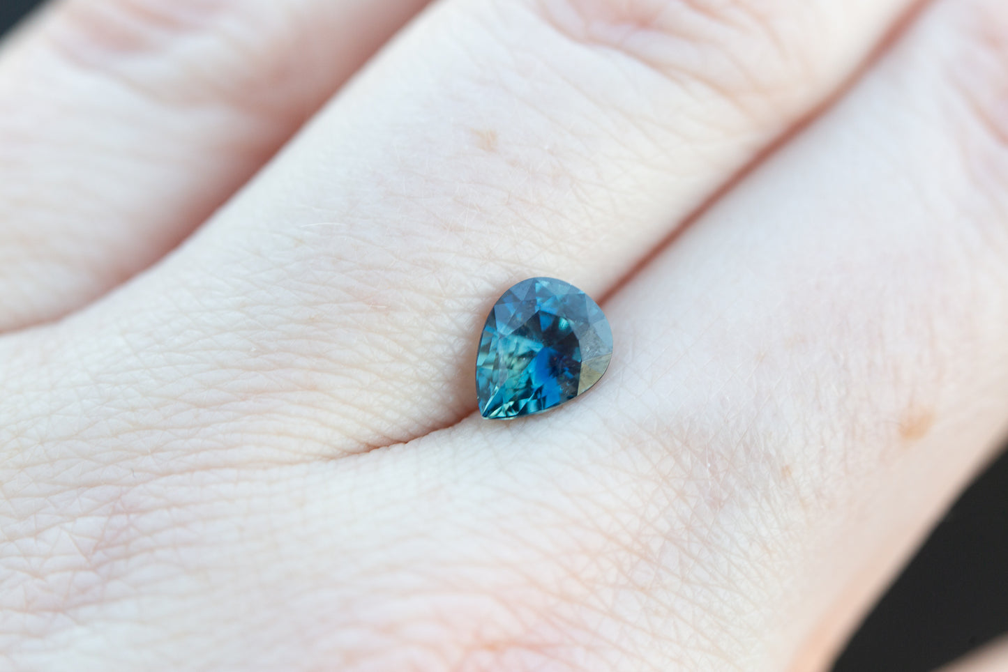 1.7ct pear deep blue teal sapphire