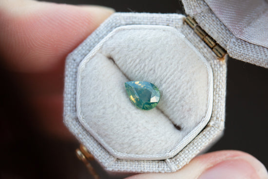 1.02ct pear opalescent teal green sapphire
