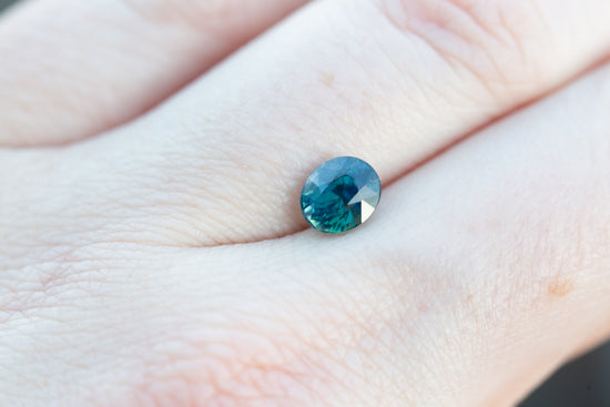 1.54ct oval opalescent blue green teal sapphire