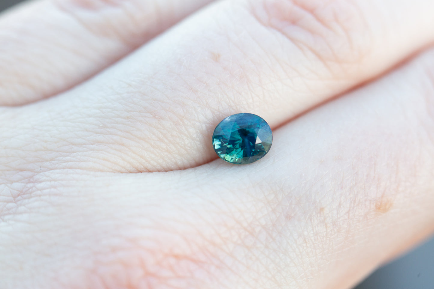1.54ct oval opalescent blue green teal sapphire