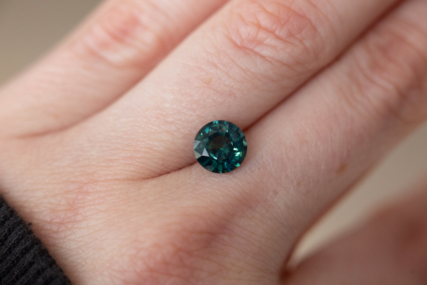 2.2ct 8mm round blue green sapphire