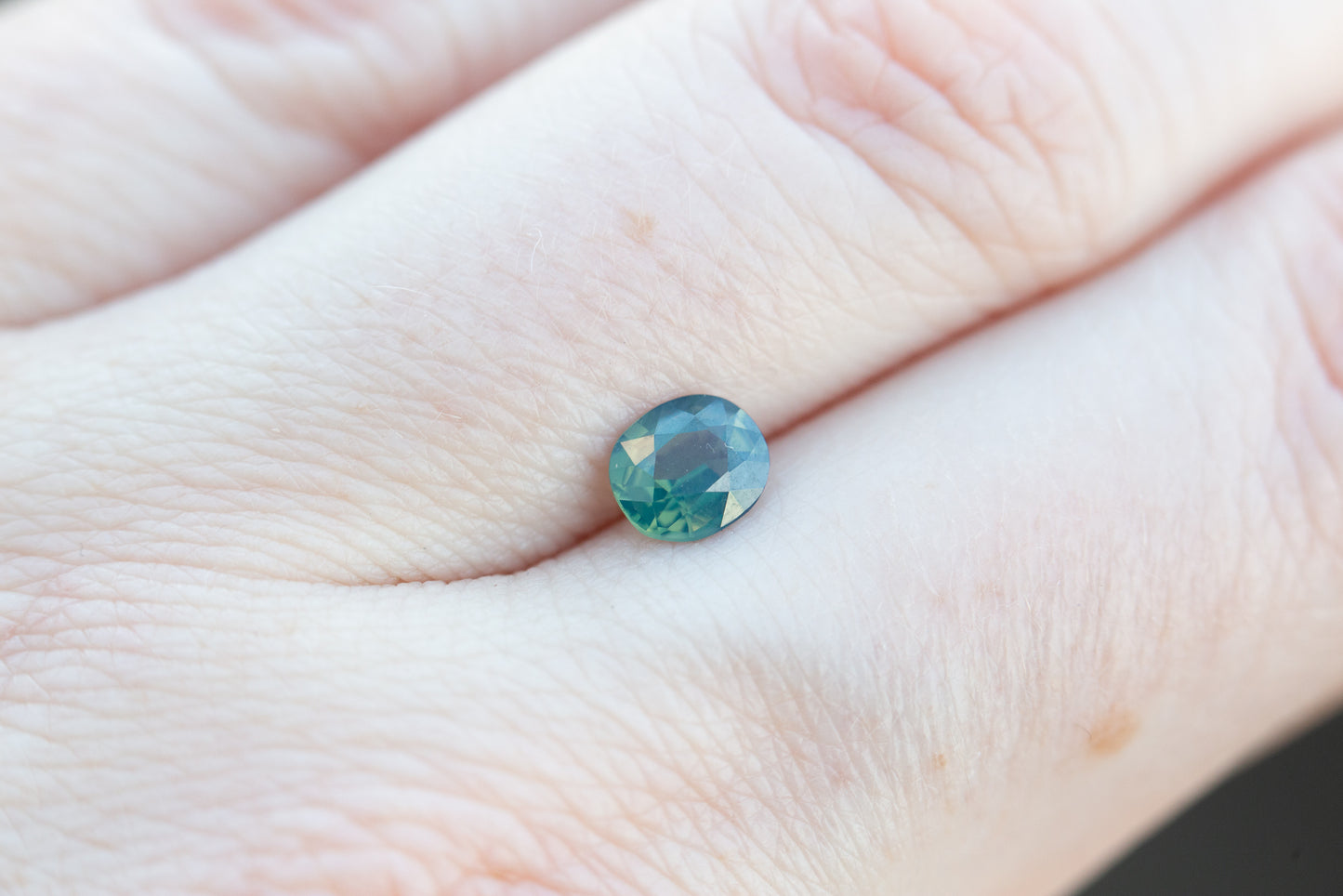 .82ct oval opalescent blue green sapphire