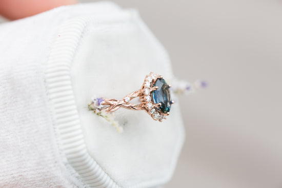 Load image into Gallery viewer, Oval blue green sapphire halo twist leaf ring
