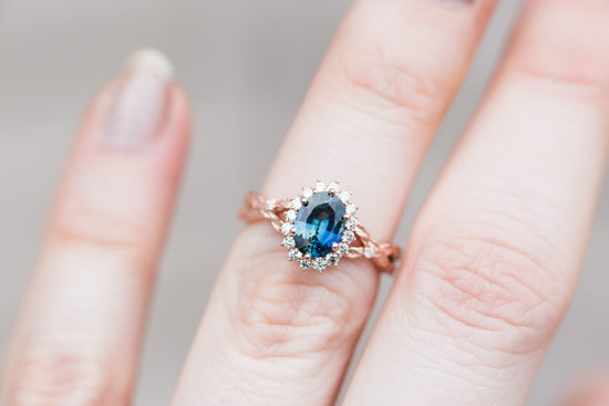 Load image into Gallery viewer, Oval blue green sapphire halo twist leaf ring
